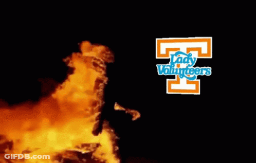 A Logo For The Lady Volunteers Is Displayed Next To A Fire GIF