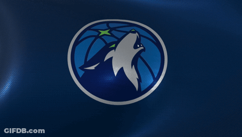A Logo For The Minnesota Timberwolves With A Wolf Howling GIF