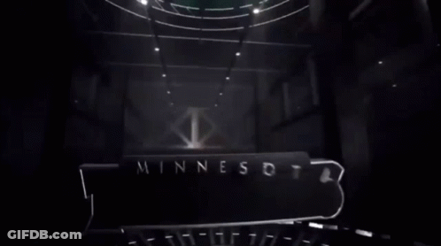 A Logo For The Minnesota Timberwolves With A Wolf GIF