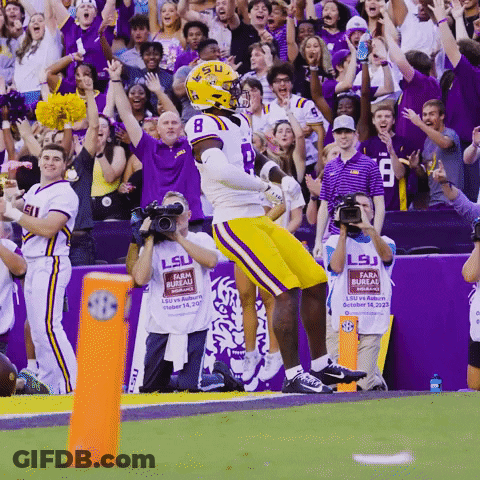 A Lsu Football Player Jumps In The Air GIF