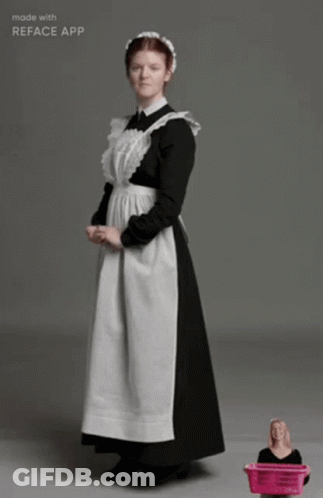 A Maid In A Black And White Dress Is Made With Reface App GIF