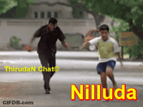 A Man And A Boy Are Running Down A Street With The Word Niluda On The Bottom Right GIF