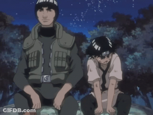 A Man And A Boy Are Sitting Next To Each Other And The Boy Has A Bandana On His Head GIF