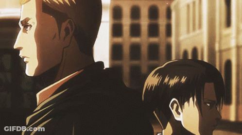 A Man And A Boy Are Standing Back To Back In Front Of A Building GIF