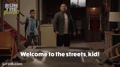 A Man And A Boy Are Standing In A Room With The Words Welcome To The Streets Kid Written On The Bottom GIF