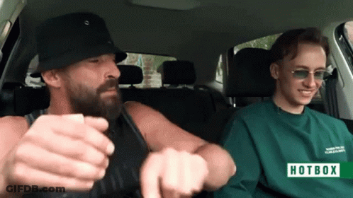 A Man And A Boy In A Car With A Hotbox Sign GIF