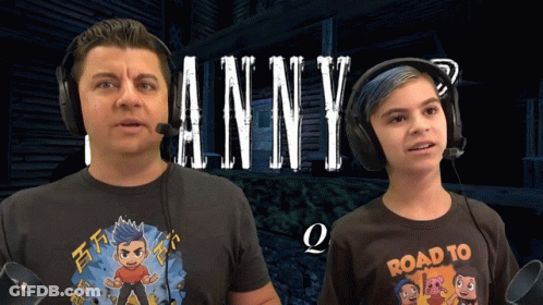 A Man And A Boy Wearing Headphones Are Playing A Game Called Tanny GIF