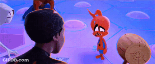 A Man And A Cartoon Character Are Standing Next To Each Other On A Blue Background . GIF