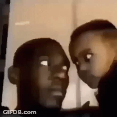 A Man And A Child Are Looking At Each Other In A Mirror . GIF