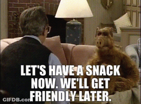 A Man And A Dog Are Sitting On A Couch With The Words Let 'S Have A Snack Now GIF