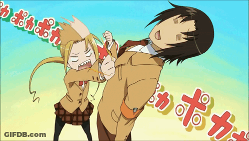 A Man And A Girl Are Fighting In A Cartoon With Foreign Writing GIF
