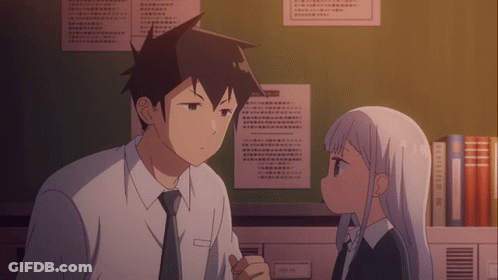 A Man And A Girl Are Looking At Each Other In Front Of A Wall With Papers Hanging On It GIF