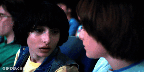 A Man And A Girl Are Looking At Each Other GIF