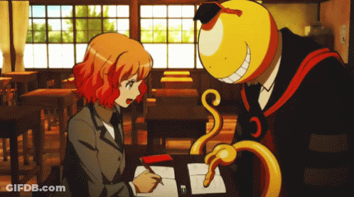 A Man And A Girl Are Sitting At A Desk In A Classroom And The Girl Is Writing In A Notebook GIF