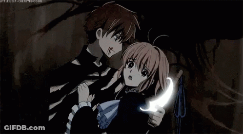 A Man And A Girl Are Standing Next To Each Other In A Dark Room . GIF