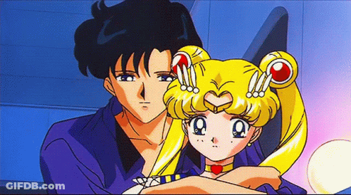 A Man And A Girl Are Standing Next To Each Other In A Room . GIF