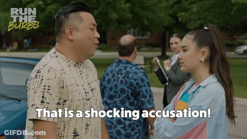 A Man And A Girl Are Standing Next To Each Other With The Words That Is A Shocking Accusation GIF