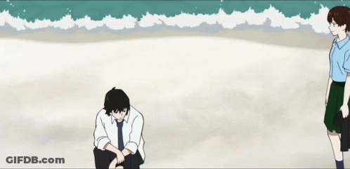 A Man And A Girl Are Standing On A Beach With The Ocean In The Background GIF