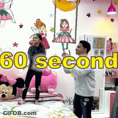 A Man And A Girl Standing In Front Of A Wall That Says 60 Second GIF
