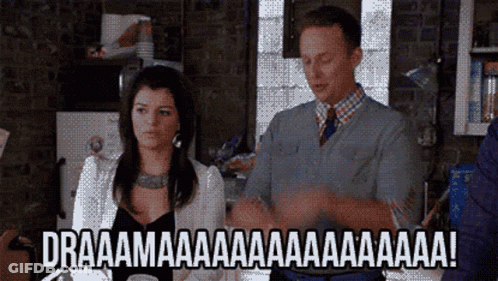 A Man And A Woman Are Clapping Their Hands In A Kitchen With The Words Draaamaaa Written On The Bottom GIF