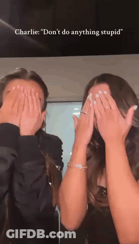 A Man And A Woman Are Covering Their Faces With Their Hands And The Words Charlie Don 'T Do Anything Stupid Are Above Th GIF