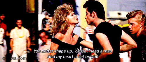 A Man And A Woman Are Dancing And The Woman Says You Better Shape Up GIF
