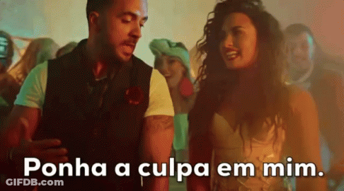 A Man And A Woman Are Dancing At A Party And The Woman Is Saying Ponha A Culpa Em Mim GIF