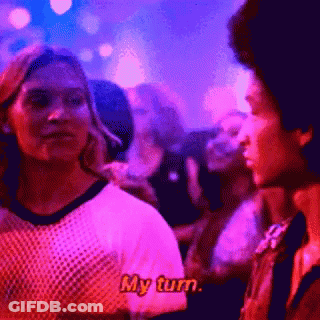 A Man And A Woman Are Dancing In A Club And The Woman Says My Turn GIF