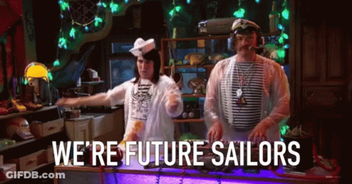 A Man And A Woman Are Dancing In A Room With The Words We 'Re Future Sailors Written On The Wall GIF
