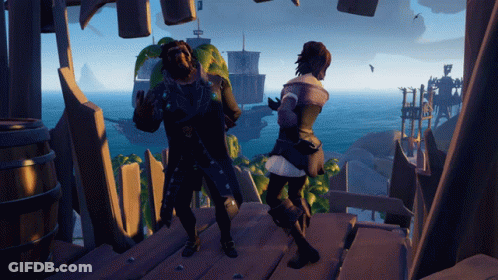 A Man And A Woman Are Dancing In Front Of A Large Body Of Water GIF