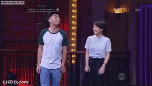A Man And A Woman Are Dancing On A Stage With The Website Www.honeycam.tv Visible GIF