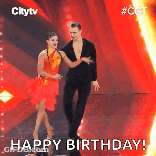 A Man And A Woman Are Dancing On A Stage With The Words Happy Birthday . GIF