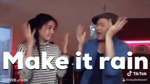 A Man And A Woman Are Dancing With The Words Make It Rain In The Background GIF