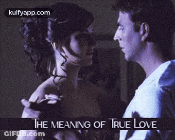 A Man And A Woman Are Dancing With The Words The Meaning Of True Love Below Them GIF