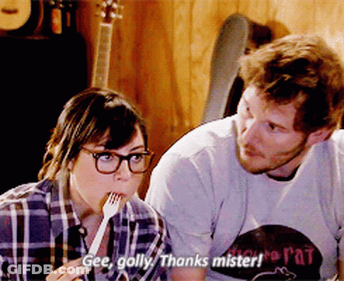A Man And A Woman Are Eating And The Woman Is Saying Gee Golly Thanks Mister ! GIF