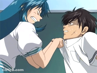 A Man And A Woman Are Fighting Each Other In A Classroom GIF