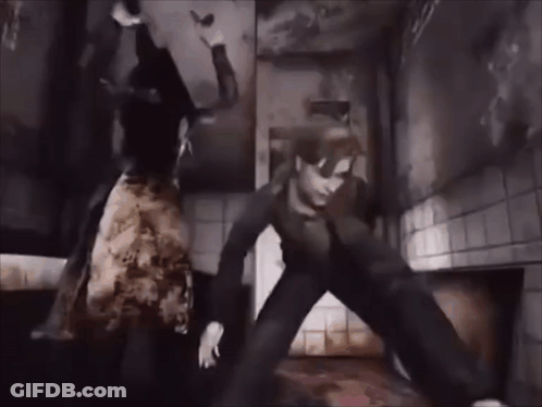 A Man And A Woman Are Fighting In A Dark Room In A Video Game . GIF