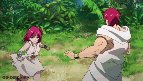 A Man And A Woman Are Fighting In A Jungle GIF