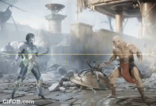 A Man And A Woman Are Fighting In A Video Game .. GIF
