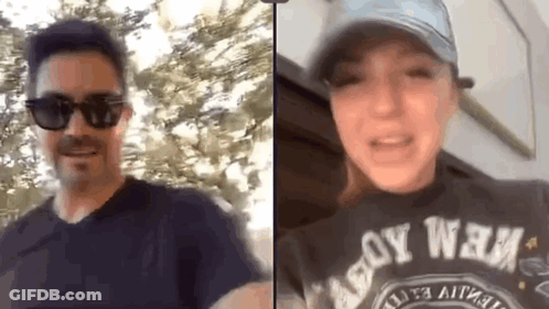 A Man And A Woman Are Having A Video Call . GIF