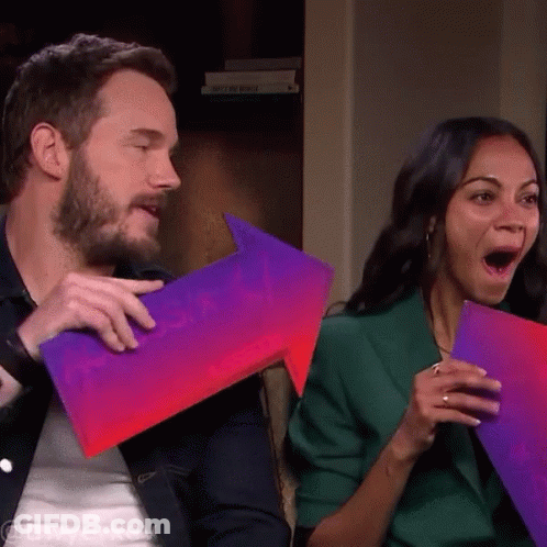 A Man And A Woman Are Holding Signs That Say ' Style ' GIF
