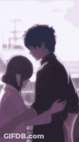 A Man And A Woman Are Hugging Each Other In A Purple Background . GIF
