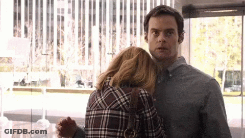 Man And Woman Hugging Woman In Plaid Shirt GIF