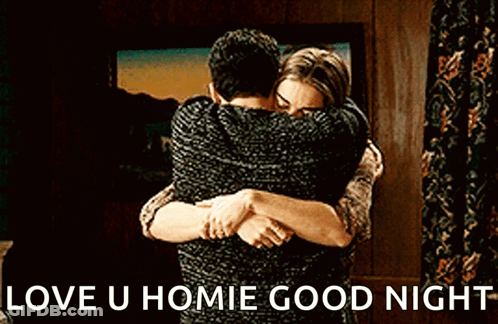 A Man And A Woman Are Hugging Each Other In A Room With The Words `` Love U Homie Good Night '' . GIF