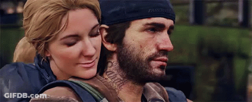 A Man And A Woman Are Hugging Each Other . The Woman Has A Tattoo On Her Neck . GIF
