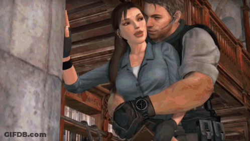 A Man And A Woman Are Hugging In A Library GIF
