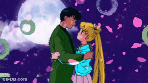 A Man And A Woman Are Hugging In Front Of A Full Moon With Petals Falling Around Them GIF