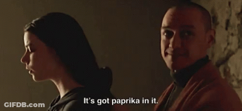 A Man And A Woman Are In A Dark Room And The Man Says It 'S Got Paprika In It GIF