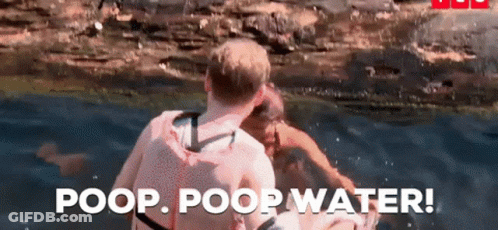 A Man And A Woman Are In The Water And The Words Poop Poop Water Are Visible GIF
