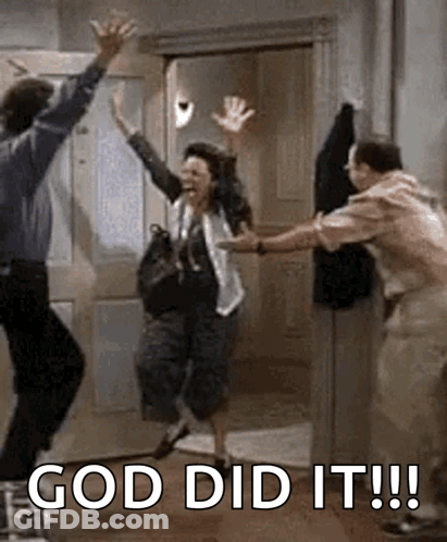 A Man And A Woman Are Jumping In The Air In A Doorway With The Words God Did It ! GIF